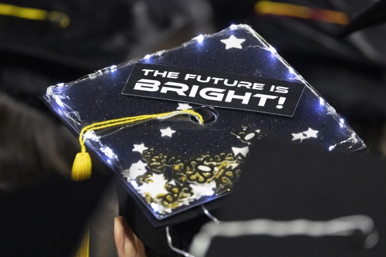photo of mortarboard with writing on top